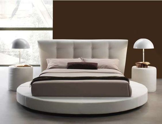 Low Profile Round Bed Design With Beautiful Round Side Table.