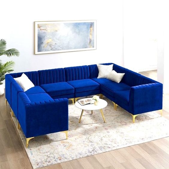 Beautiful U-Shape Sofa With Classy Royal Blue Color Scheme theme.